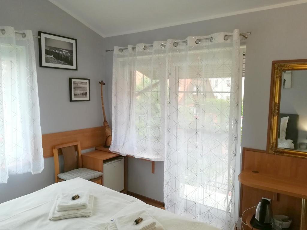 Pokój dwuosobowy z balkonem – zdjęcie pokoju w Sopocie